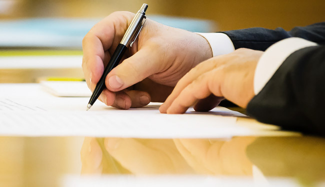signing_4b_document_pen_law_decree_irs