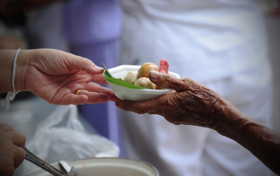 web3-hand-give-food-to-hands-of-a-beggar-stvp001-shutterstock_6742969931