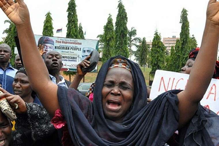 family_of_kidnapped_school_girls_in_nigeria_credit_pedro_via_flickr_cc_by_20_cna