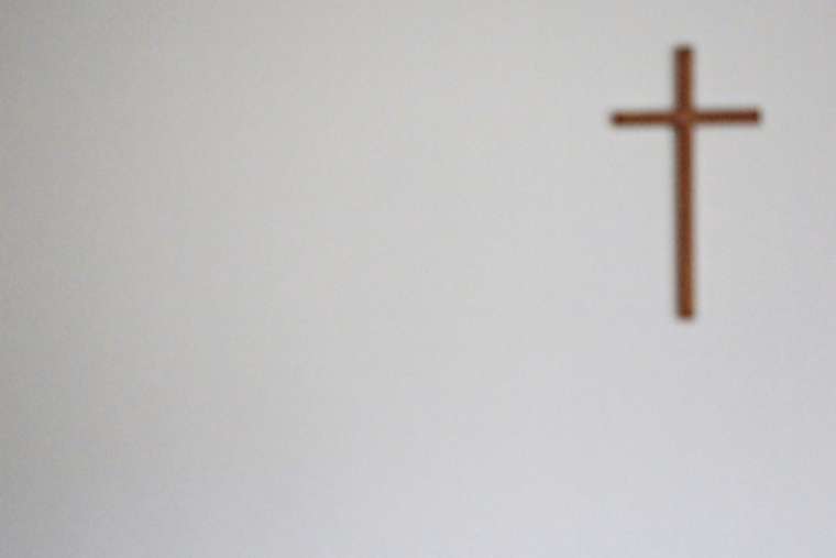 a_cross_on_the_wall_credit_gypsyaiko_shutterstock_cna