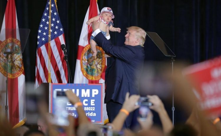 trump_with_baby_810_500_75_s_c1-750x463