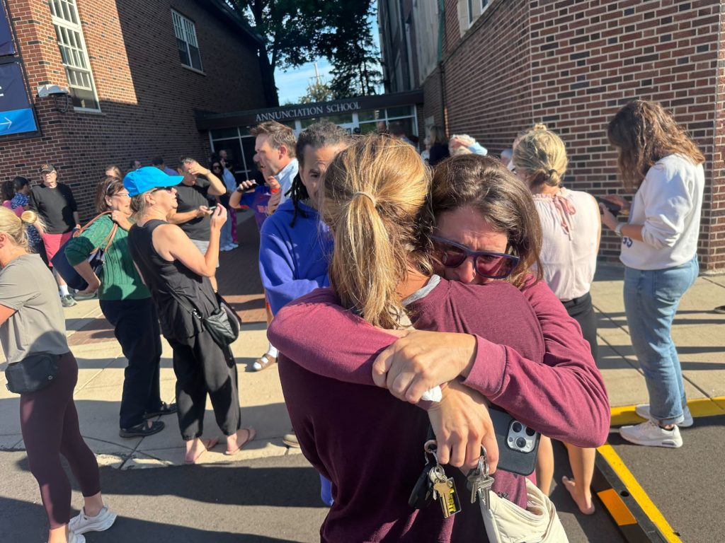 Parents await news of their children's status after shooting at Annunciation Church on Wednesday morning, Aug. 27, 2025 in Minneapolis